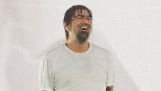 Chino Moreno smiling on stage