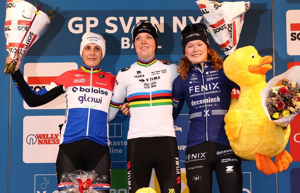 Dutch Lucinda Brand, Dutch Fem Van Empel and Dutch Puck Pieterse pictured on the podium after the women's elite race of the 'GP Sven Nys' cyclocross cycling event on Wednesday 01 January 2025 in Baal, stage 5/8 in the X2O Badkamers 'Trofee Veldrijden' competition. BELGA PHOTO DAVID PINTENS (Photo by DAVID PINTENS / BELGA MAG / Belga via AFP)