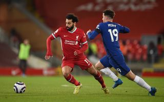 Liverpool’s Mohamed Salah (left) and Chelsea’s Mason Mount battle for the ball during the Premier League match at Anfield, Liverpool. Picture date: Thursday March 4, 2021