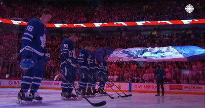 The Toronto Maple Leafs' fans belt the national anthem.