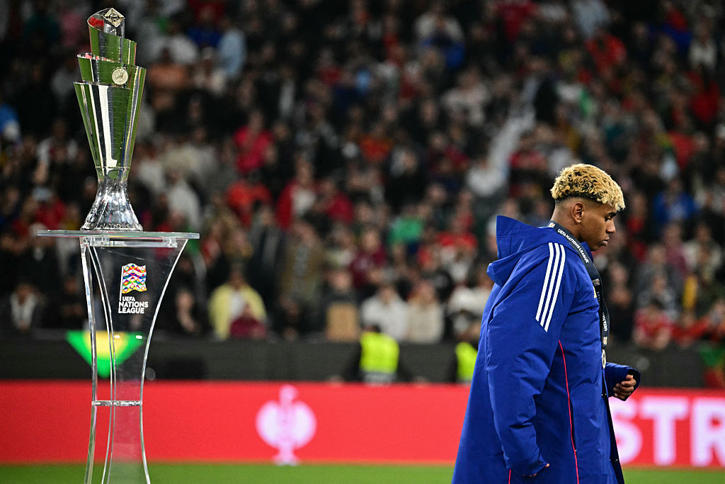 Spain's forward #19 Lamine Yamal walks past the trophy after the UEFA Nations League final football match between Portugal and Spain in Munich, southern Germany on June 8, 2025.