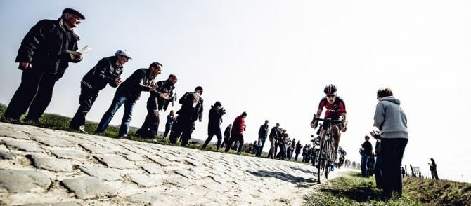 BMC's Michael Sch&auml;r drives hard on the cobbles of Roubaix.