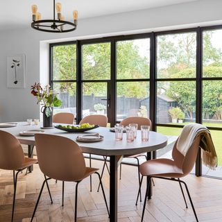dining room with french doors and dining table and chair