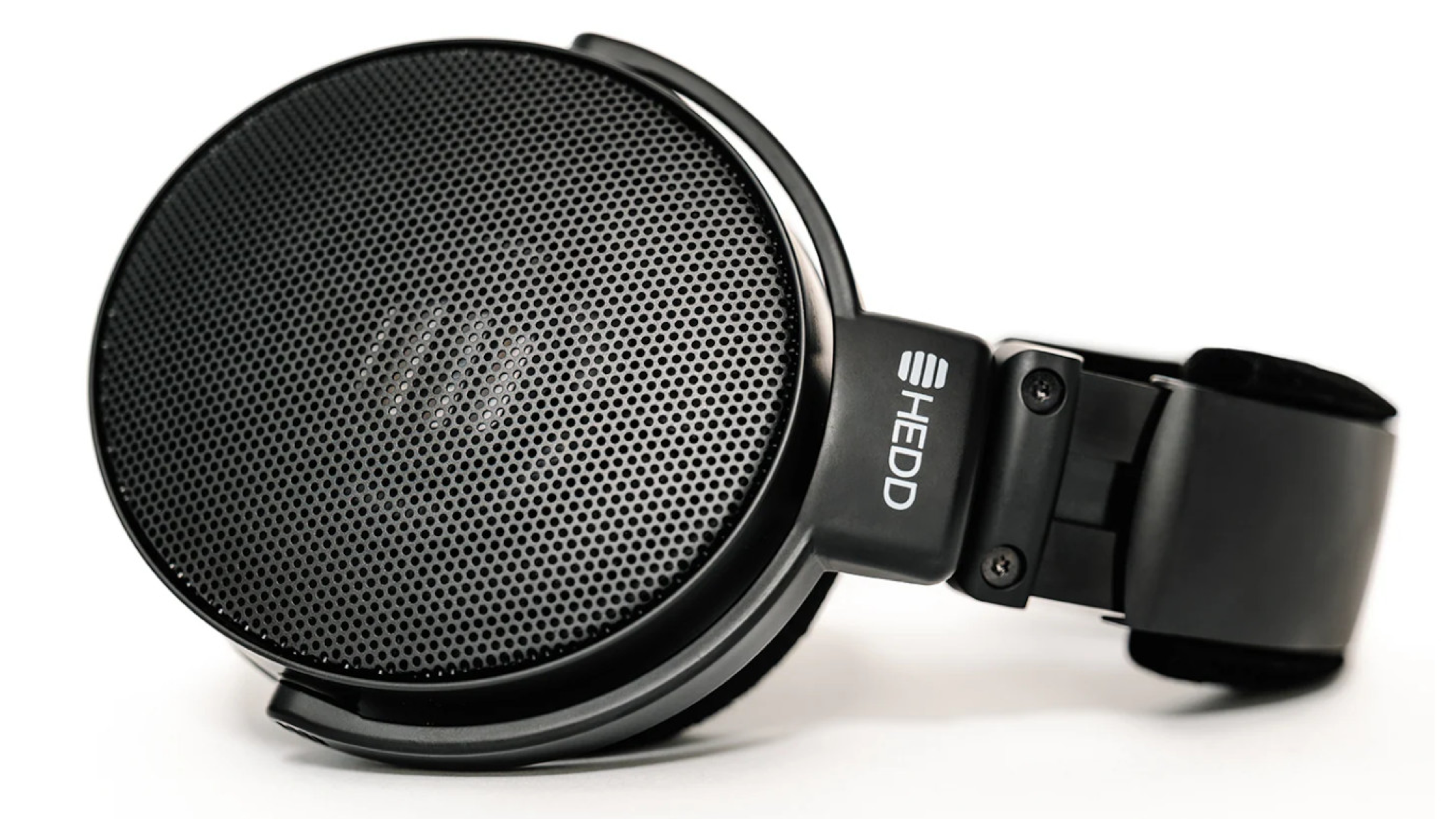 HEDDphone D1 headphones on their side on a white surface and background
