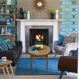 living room with geometric wallpaper and fireplace