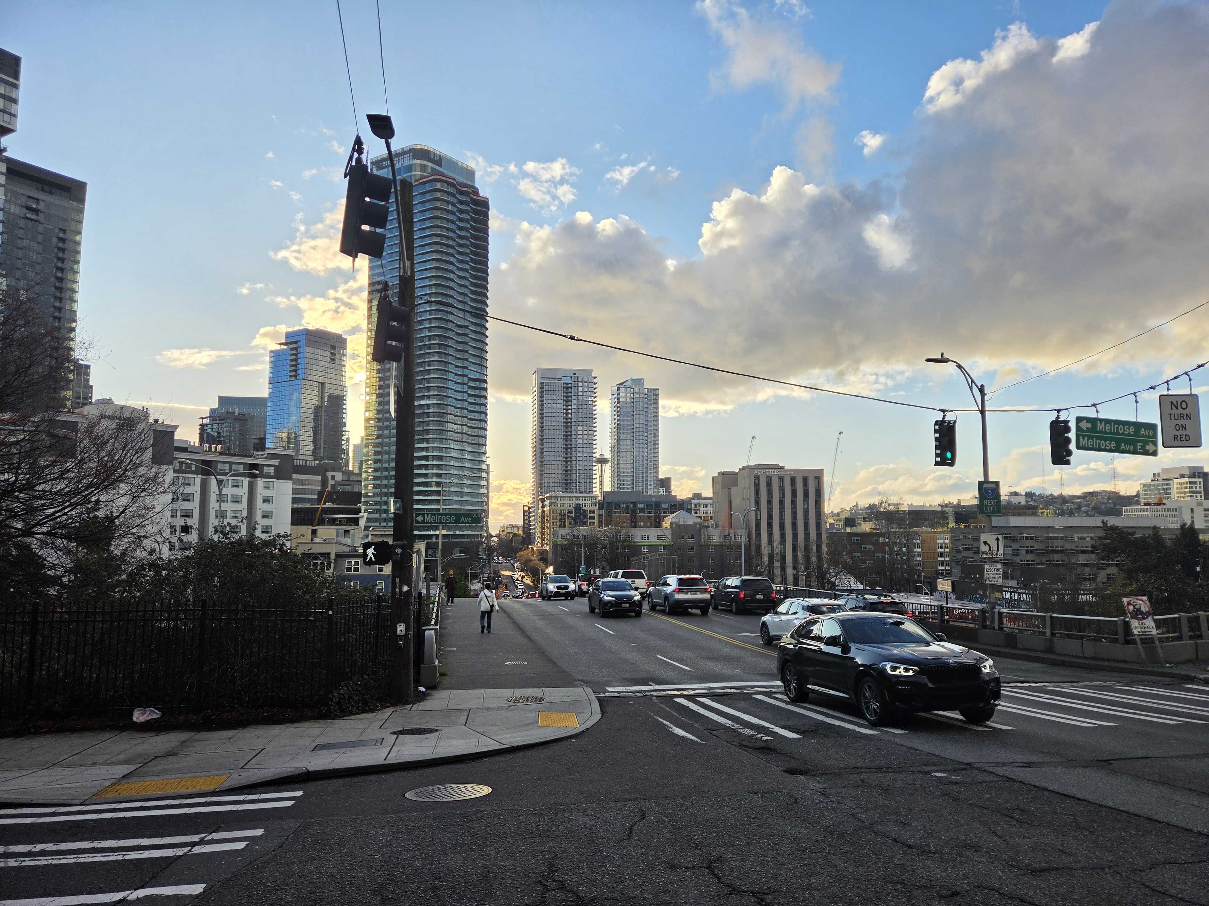 The Seattle Space Needle in the distance between two buildings