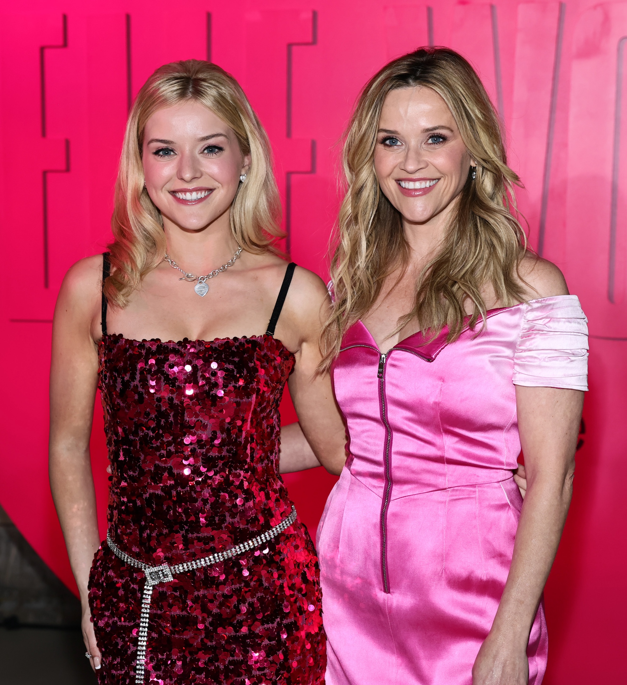 Lexi Minetree and Reese Witherspoon smiling at "Elle World" in New York City