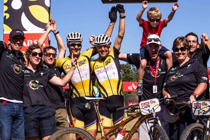 Jaroslav Kulhavy and Christoph Sauser of Burry Stander-Songo and supporters