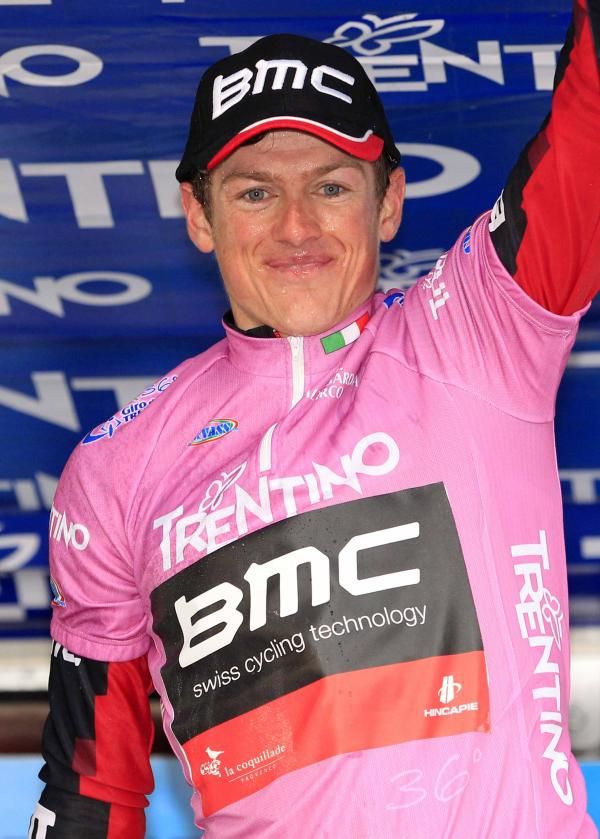 Mathias Frank (BMC) celebrates in the pink jersey.