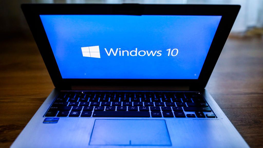 The Windows 10 logo on an open laptop