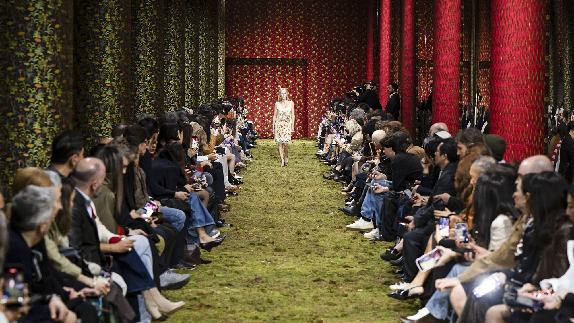 Gillian Anderson walks the runway during the Miu Miu Ready to Wear Fall/Winter 2026-2027 fashion show as part of Paris Fashion Week with moss on the runway