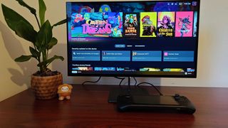 Dough Spectrum Black monitor with Steam Deck OLED connected via USB-C with SteamOS on screen