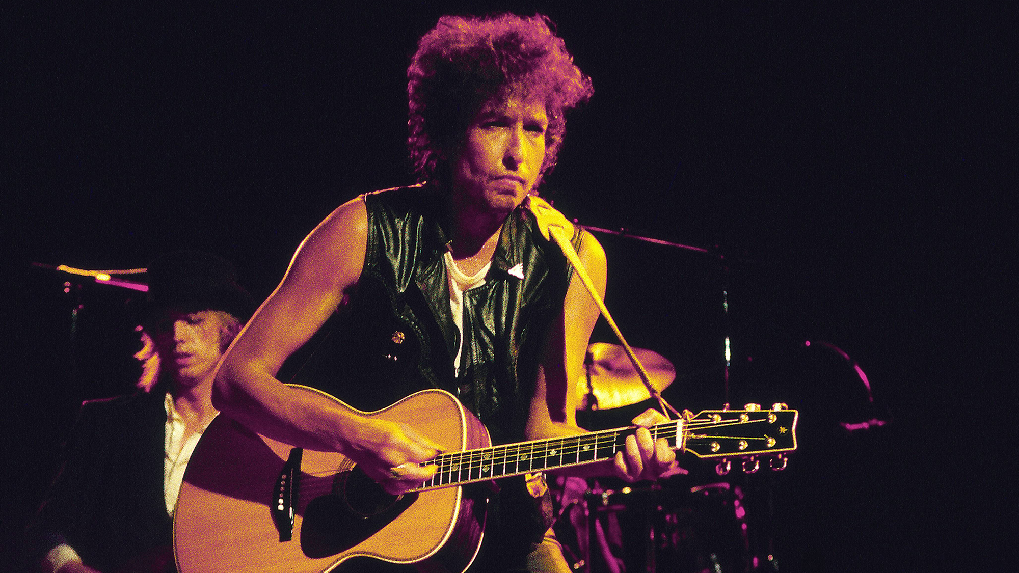 Bob Dylan performing live onstage in 1980