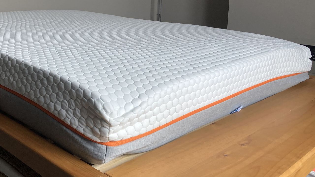 Lola Cool Hybrid mattress freshly out of its packaging, just starting to expand