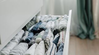 picture of a neatly organised clothes drawer