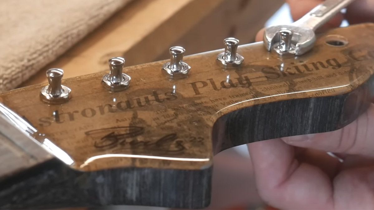 Burls Art Newspaper Guitar