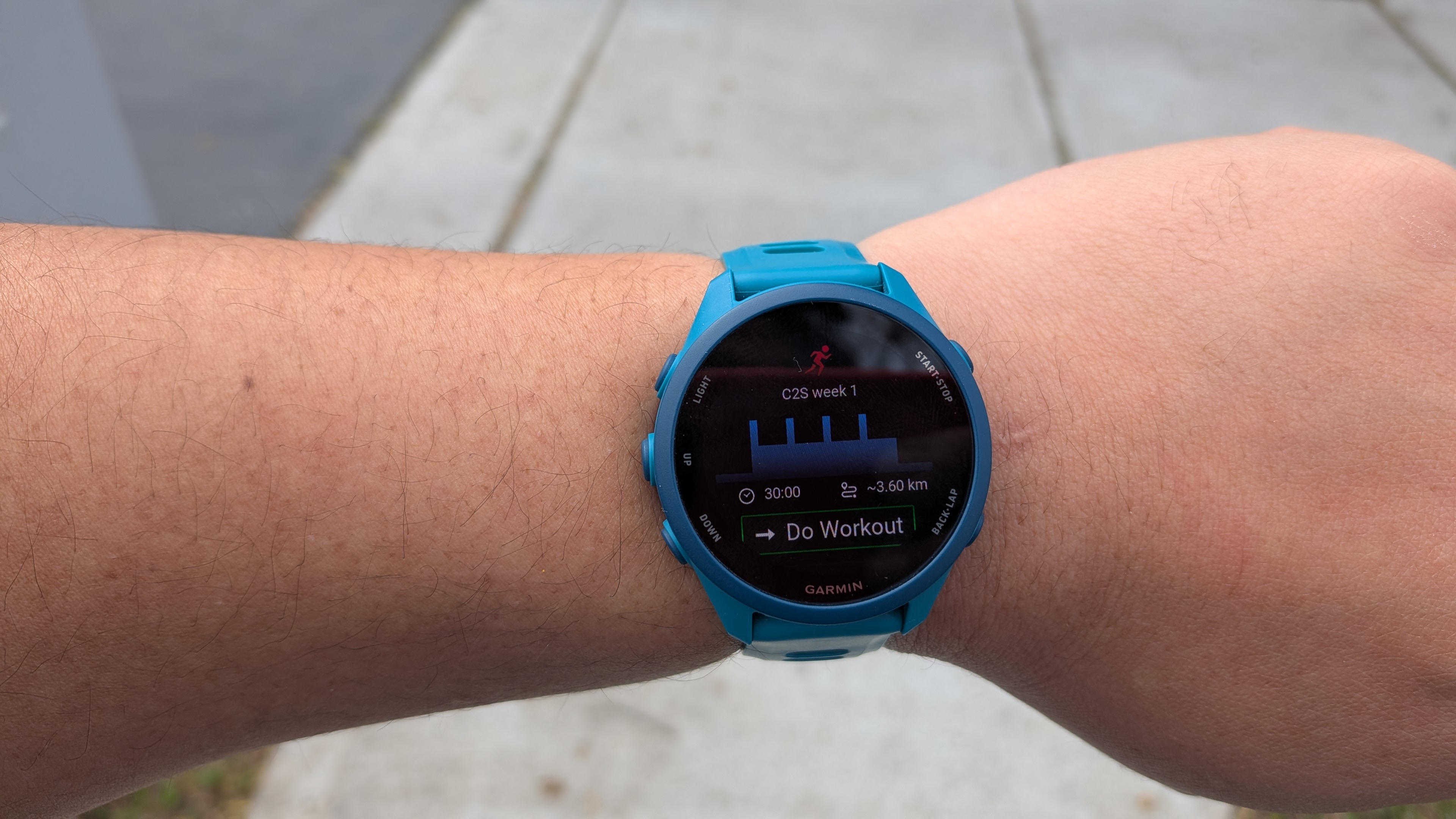 Garmin Forerunner 170 Music while worn and showing the training workout