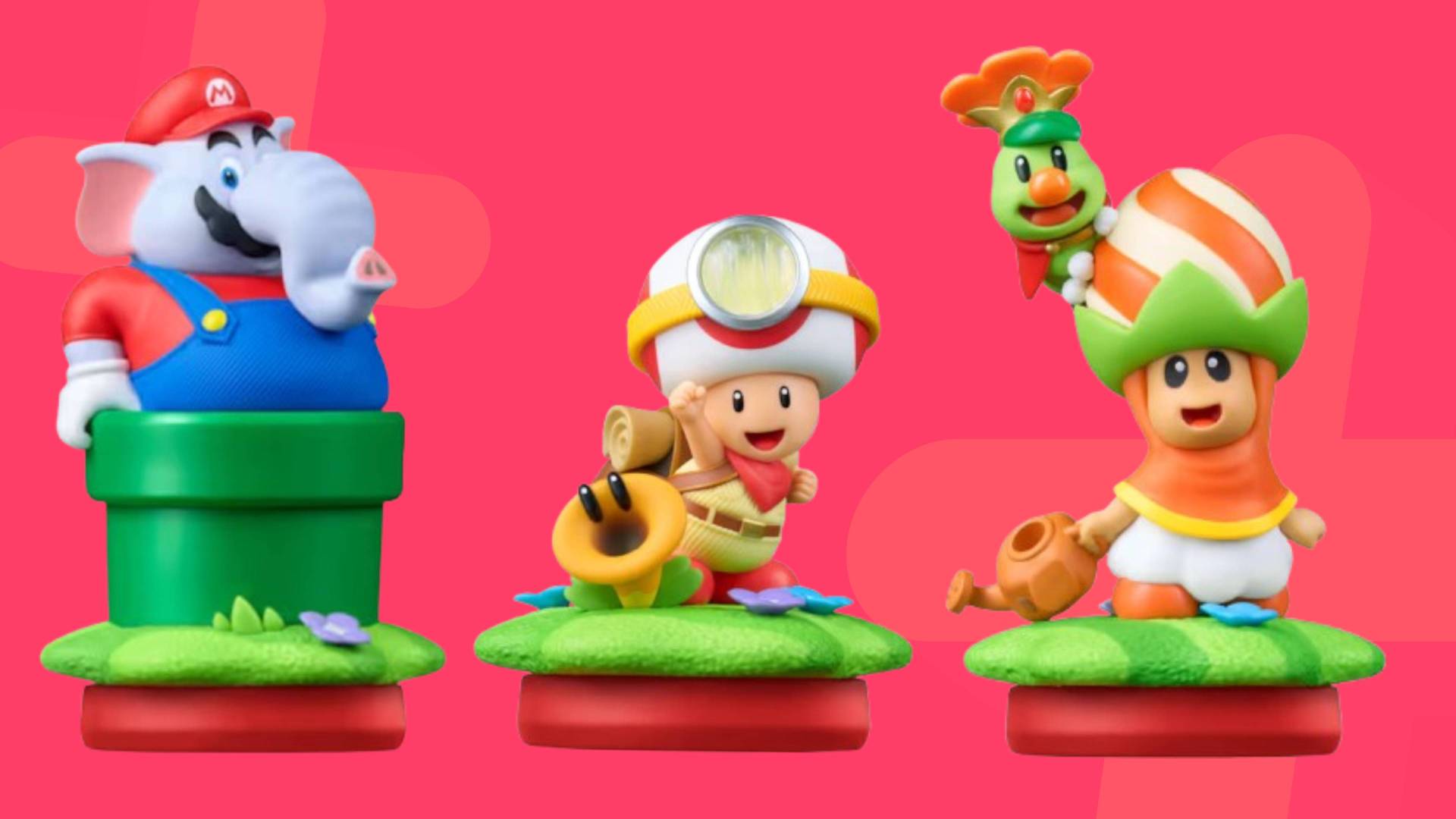 Images of three Super Mario Bros Wonder amiibo by Nintendo sitting on a pink GamesRadar+ background.