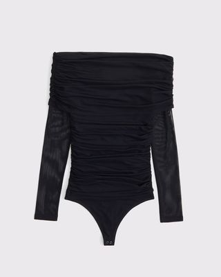 a black off-the-shoulder bodysuit