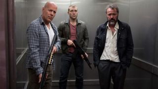 Bruce Willis and Jai Courtney in an elevator in A Good Day To Die Hard