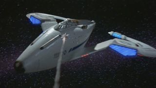 A sci-fi space ship with a central body and two wing-like structures which house the engines, flying throw space with an alien missile approaching the ship.