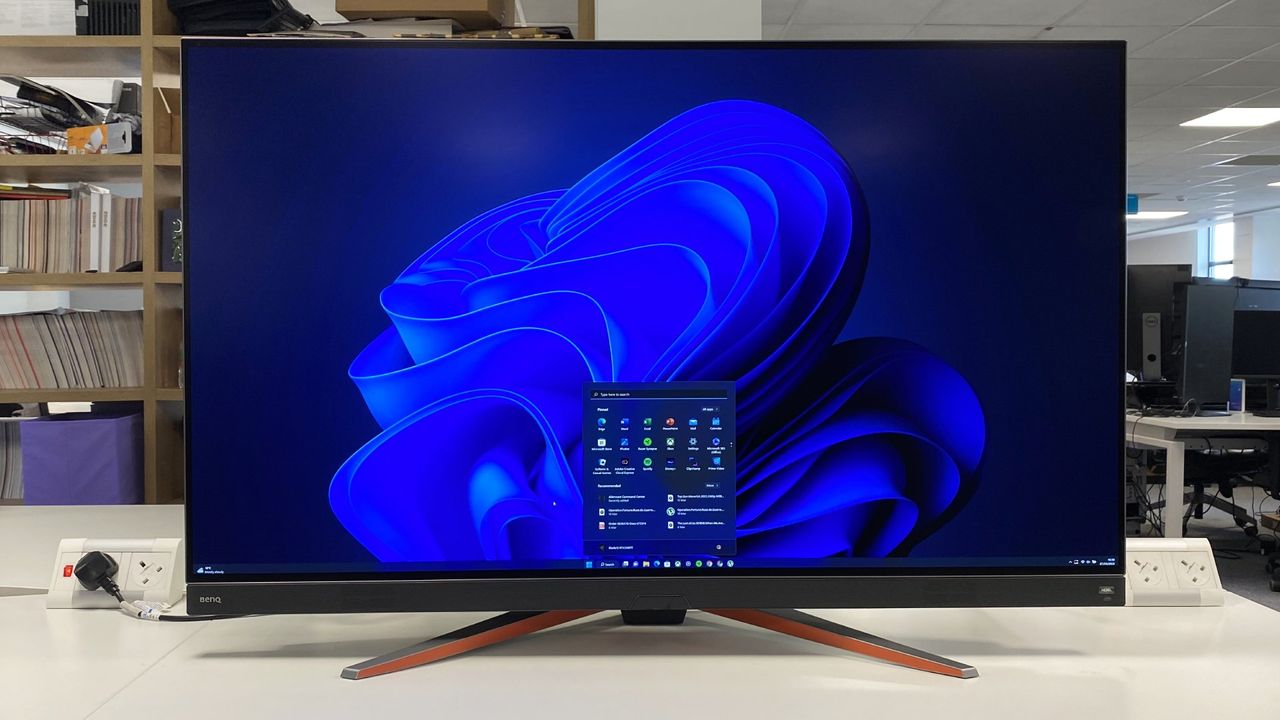 BenQ Mobiuz EX480UZ in an office setting