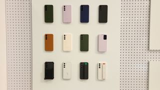 A wall of official Galaxy S23 cases at the Galaxy Experience Store.
