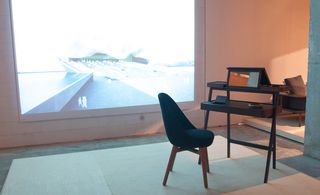 Dark brown chair and dark mirrored table