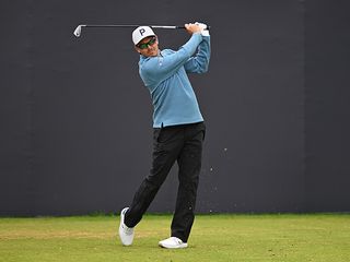 Rickie Fowler hitting a tee shot at the Open Championship