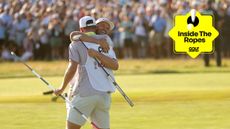 Wyndham Clark and his caddie embrace on the 18th green at Shinnecock Hills after winning the 2026 US Open, with a yellow Golf Monthly Inside The Ropes logo top-right