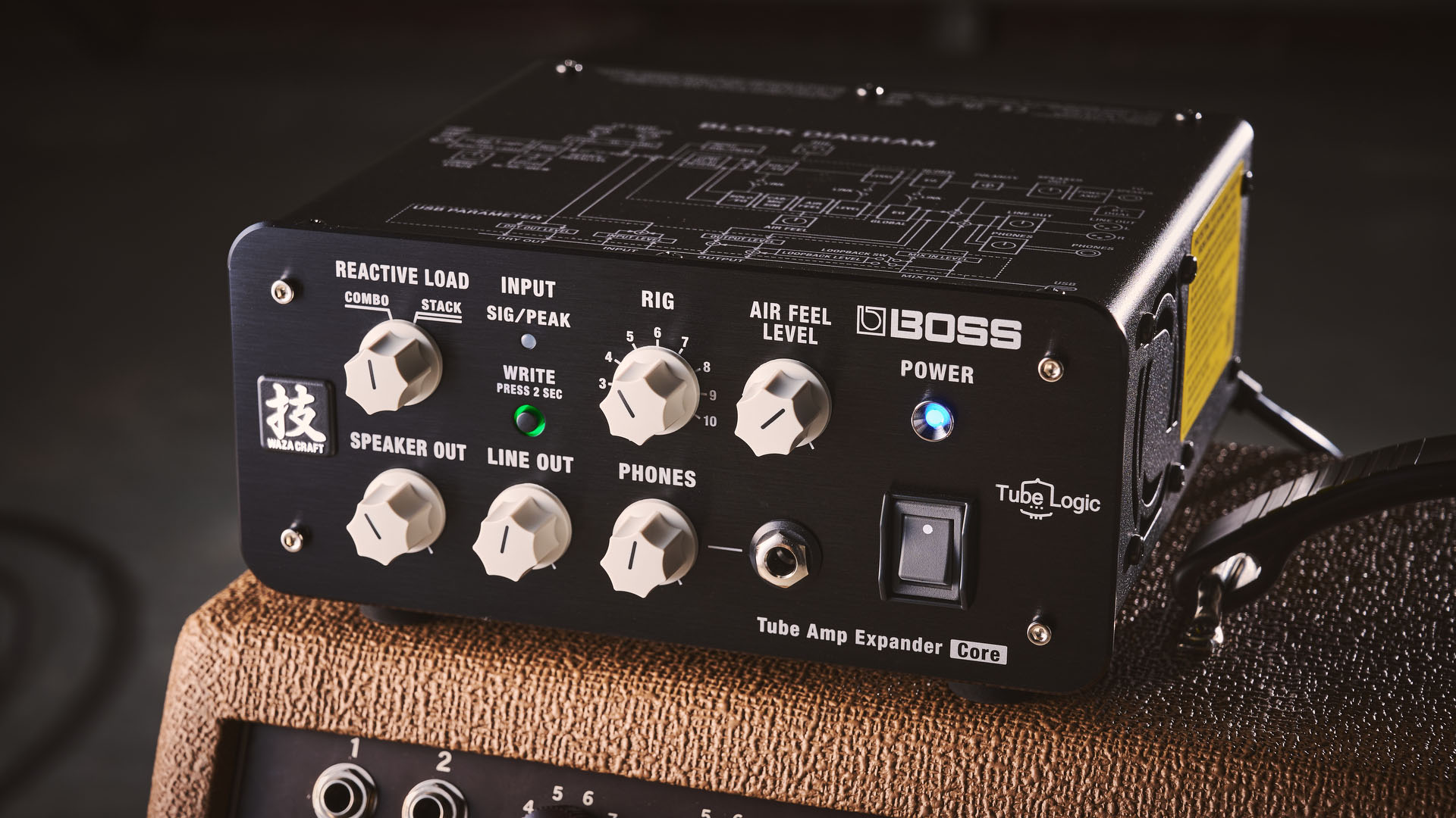 Boss WAZA Tube Amp Expander Core: the smash-hit load box has been downsized to make it more portable but retains the look – and much of the functionality – of the original, with its black enclosure, off-white dials. Here it is pictured with amps and pedals.