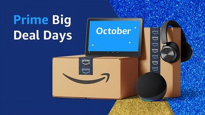 a stack of amazon delivery boxes with an echo show on top which says prime big deal days october
