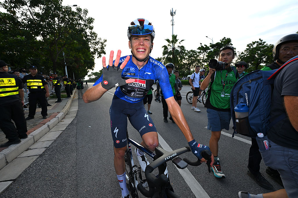 NANNING, CHINA - OCTOBER 19: Stage winner Paul Magnier of France and Team Soudal Quick-Step - Blue Points Jersey reacts after the 6th Gree-Tour Of Guangxi 2025, Stage 6 a 134.3km stage from Nanning to Nanning / #UCIWT / on October 19, 2025 in Nanning, China. (Photo by Tim de Waele/Getty Images)
