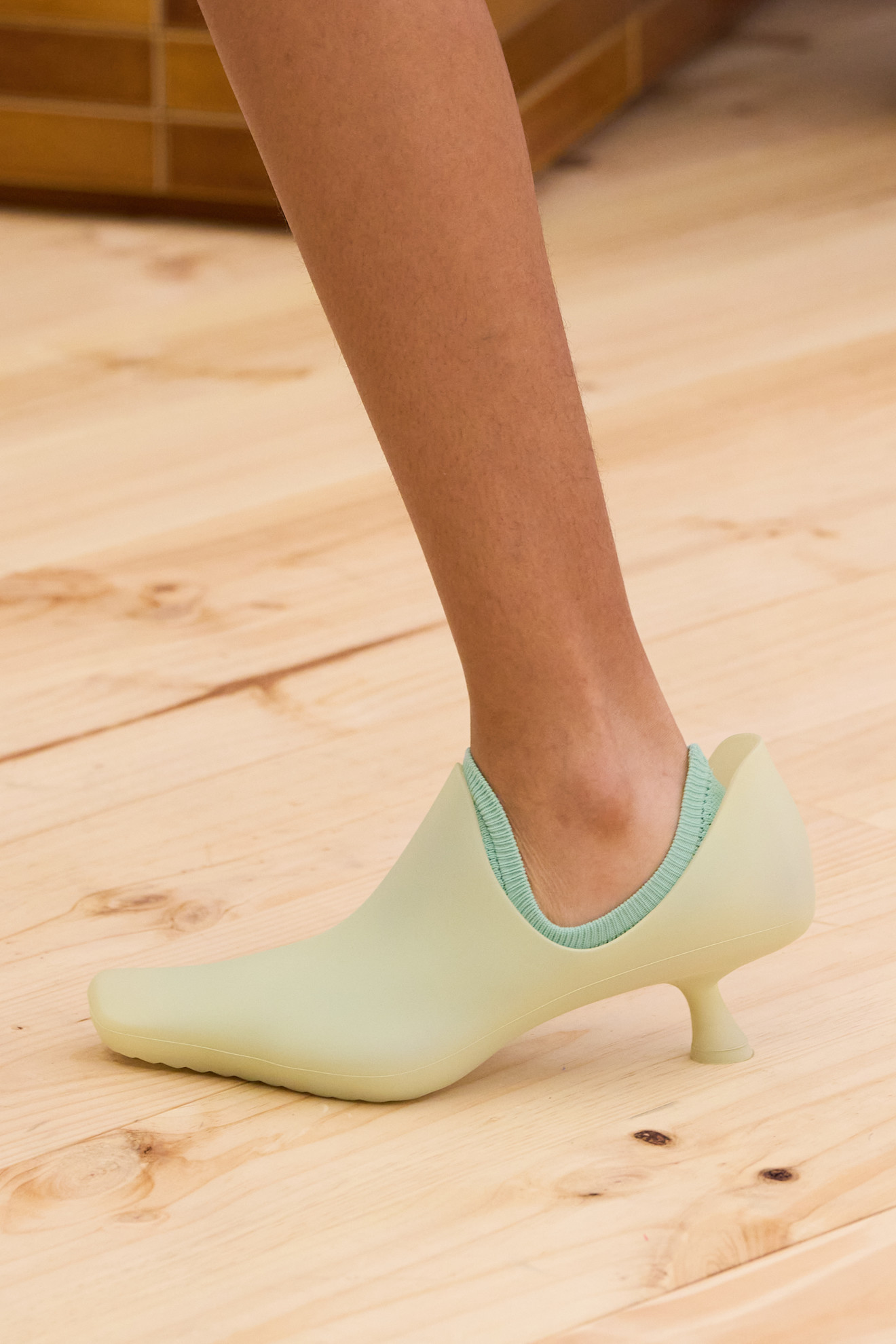 shiny plastic kitten heels with contrast socks on the Loewe Spring 2026 runway