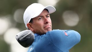 Adam Scott takes a shot during the Pebble Beach Pro-Am