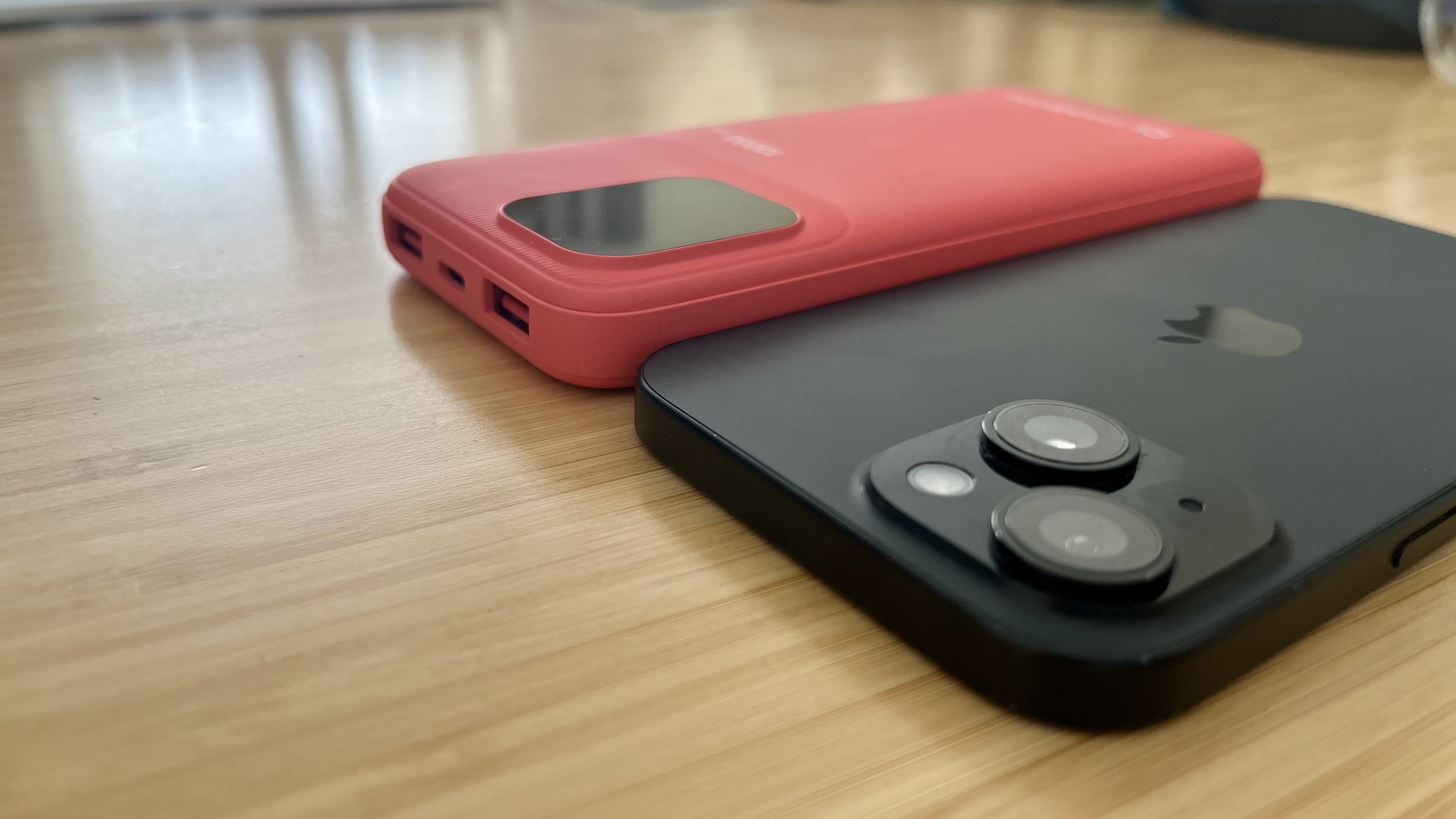 Laser ChargeCore powerbank Max 10K compared to the iPhone 15