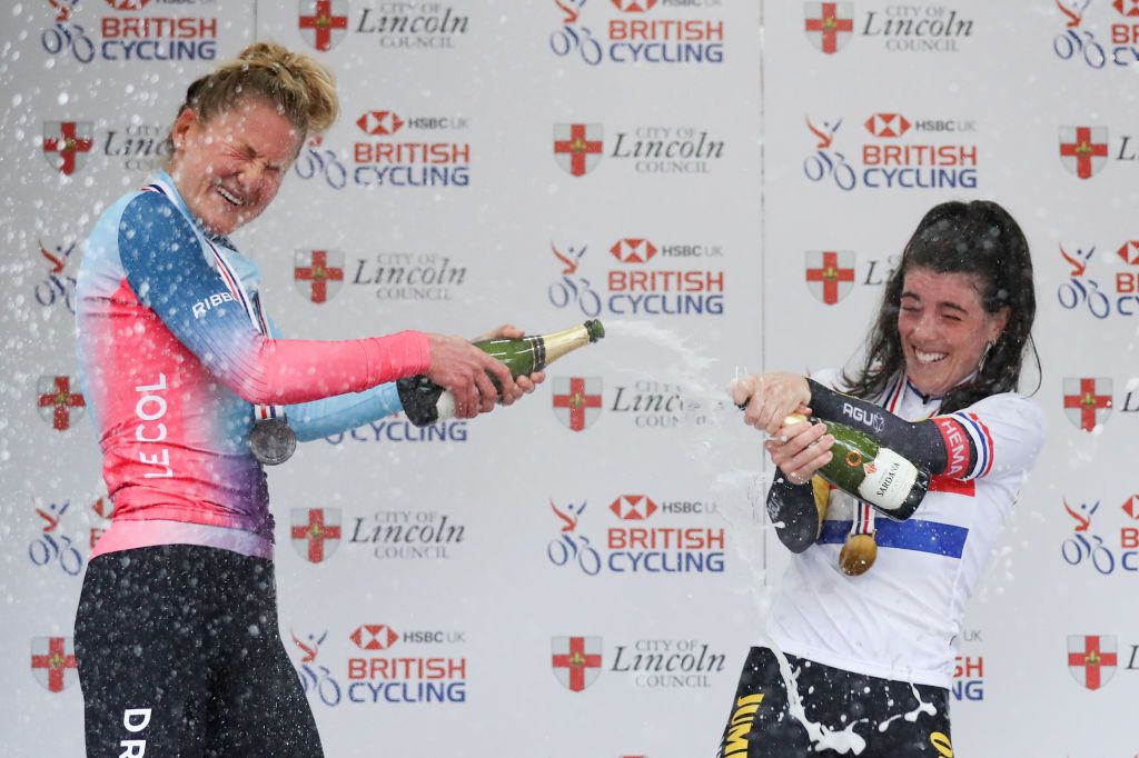 LINCOLN ENGLAND OCTOBER 14 Joscelin Lowden L of team Drops le Col and Anna Henderson R of team JumboVisma celebrate on the podium after in the Womens Individual time trial during the HSBC UK National Road Championships on October 14 2021 in Lincoln England Photo by George WoodGetty Images