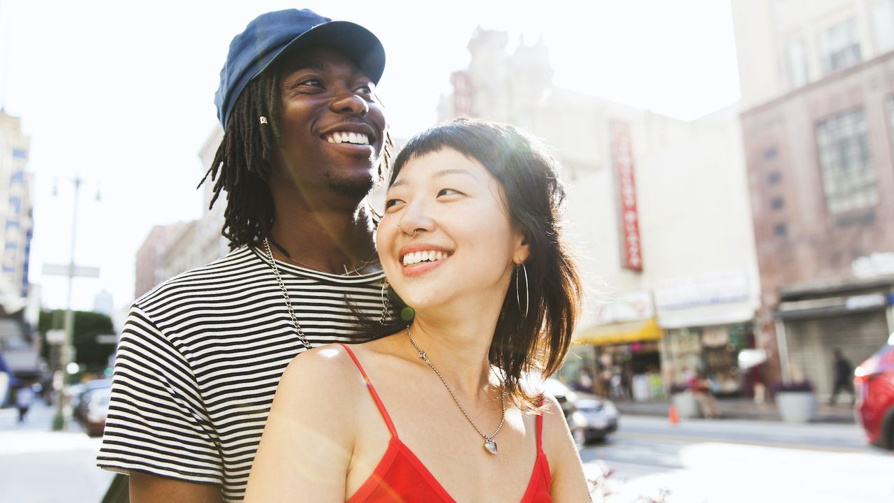 couple outside on city streets on a date