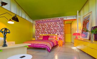 bedroom with yellow walls and green ceiling