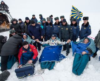 Expedition 38 Crew Safely Land