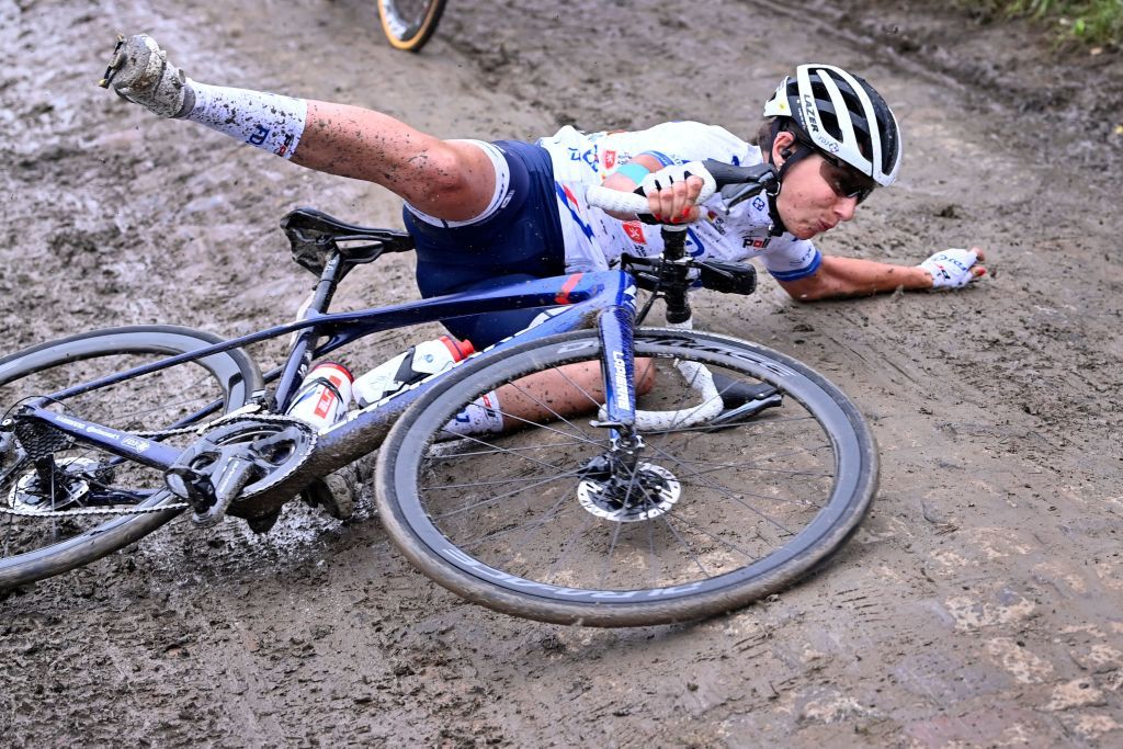 French cyclist Eugenie Duval falls during the first edition of the women elite race of the ParisRoubaix cycling event 1165km from Denain to Roubaix on October 2 2021 Belgium OUT Photo by ERIC LALMAND BELGA AFP Belgium OUT Photo by ERIC LALMANDBELGAAFP via Getty Images