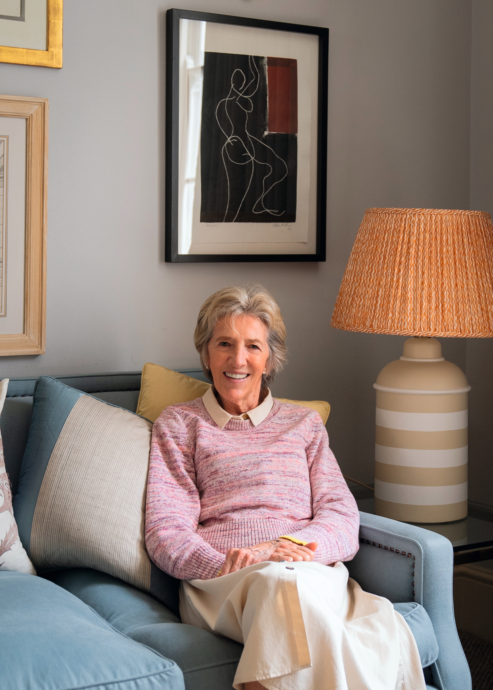 Jane Churchill sitting on a nice sofa