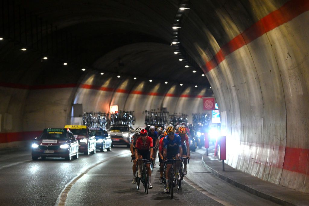 VALLOIRE FRANCE JULY 02 LR Raul Garcia Pierna of Spain and Team Arkea BB Hotels and Oier Lazkano of Spain and Movistar Team lead the breakaway passing through a tunnel during the 111th Tour de France 2024 Stage 4 a 1394km stage from Pinerolo to Valloire UCIWT on July 02 2024 in Valloire France Photo by Dario BelingheriGetty Images