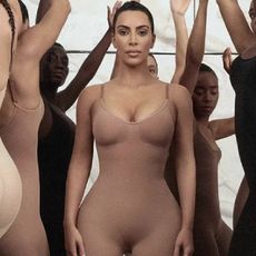 Kim Kardashian wearing a SKIMS body suit.