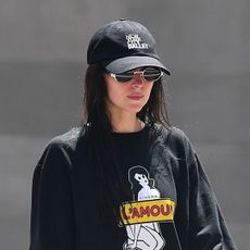 Dakota Johnson swaps her usual flat sneakers for a chunkier Nike pair.