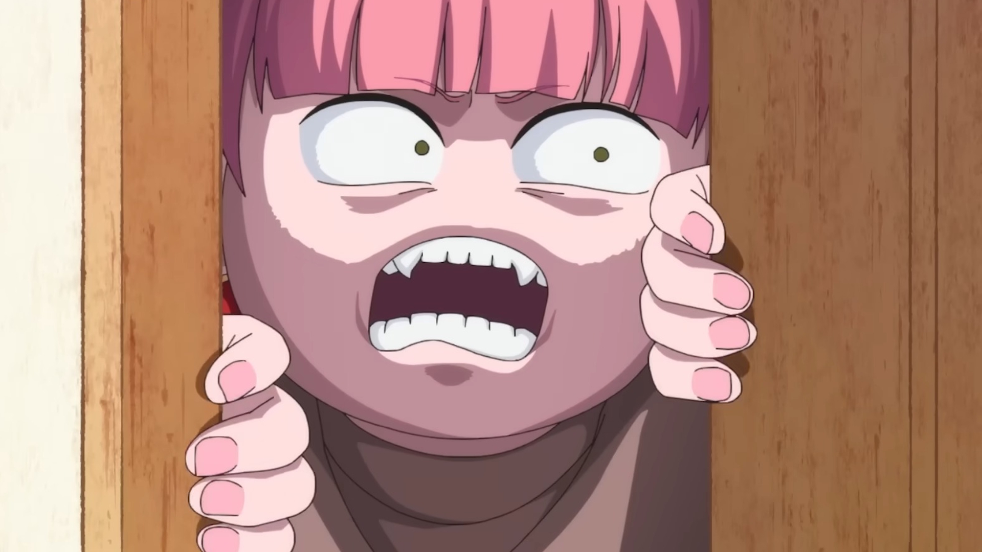 You and I Are Polar Opposite character with pink hair making a menacing face in the crack of a door