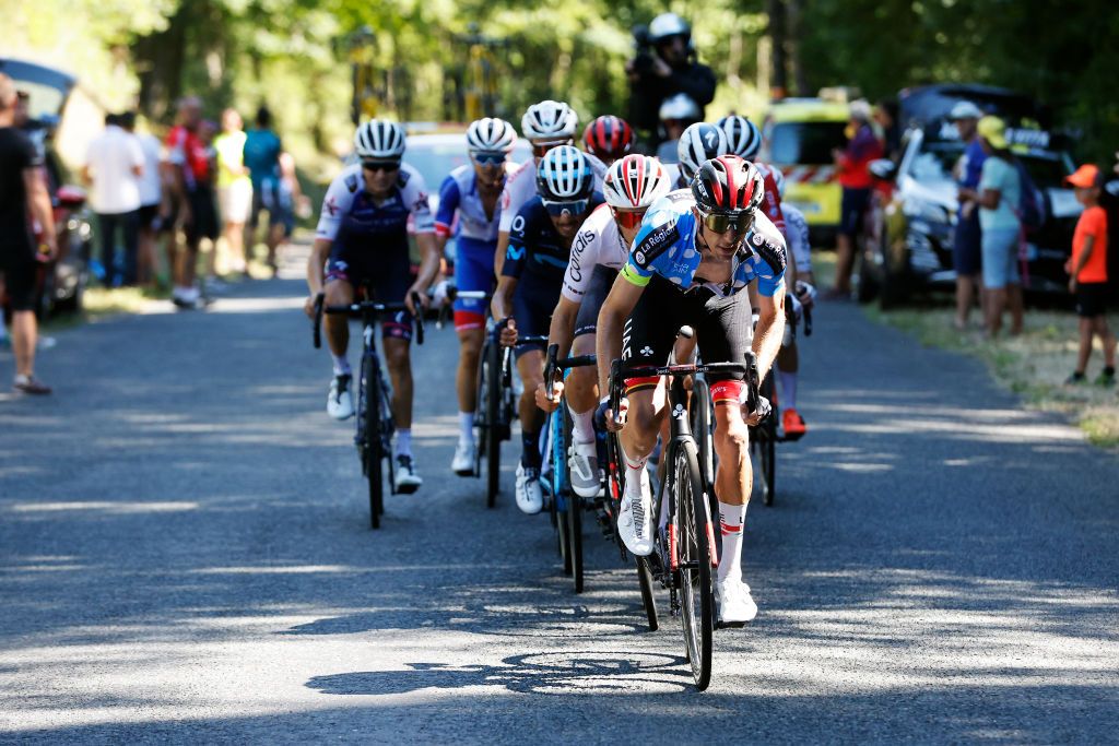 LAGNIEU FRANCE AUGUST 10 George Bennett of New Zealand and UAE Team Emirates Polka Dot Mountain Jersey competes in the chase group during the 34th Tour de lAin 2022 Stage 2 a 144km stage from SaintVulbas to Lagnieu TDA22 on August 10 2022 in Lagnieu France Photo by Bas CzerwinskiGetty Images
