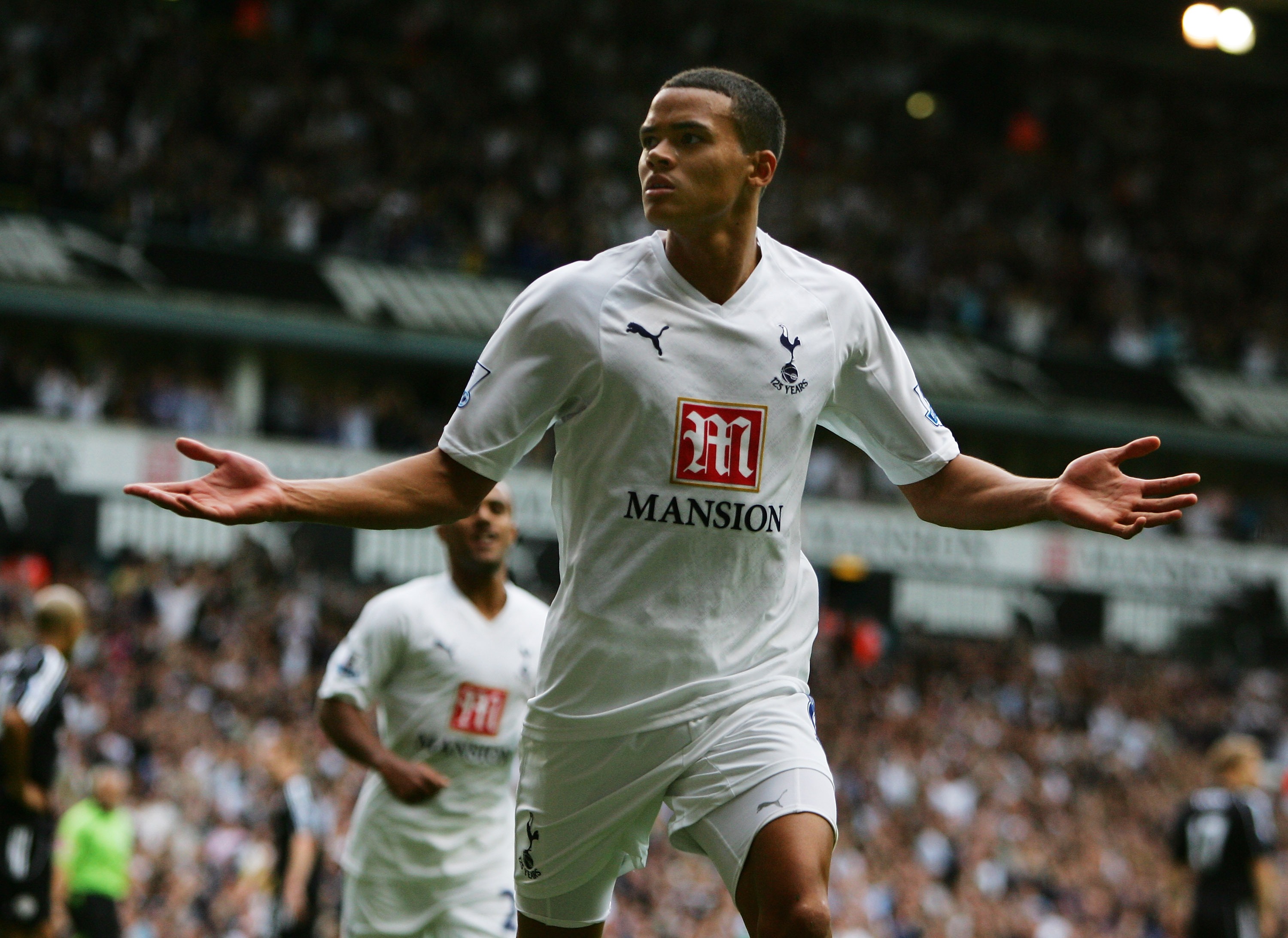 Jermaine Jenas celebrates after scoring for Tottenham against Derby County in August 2007.