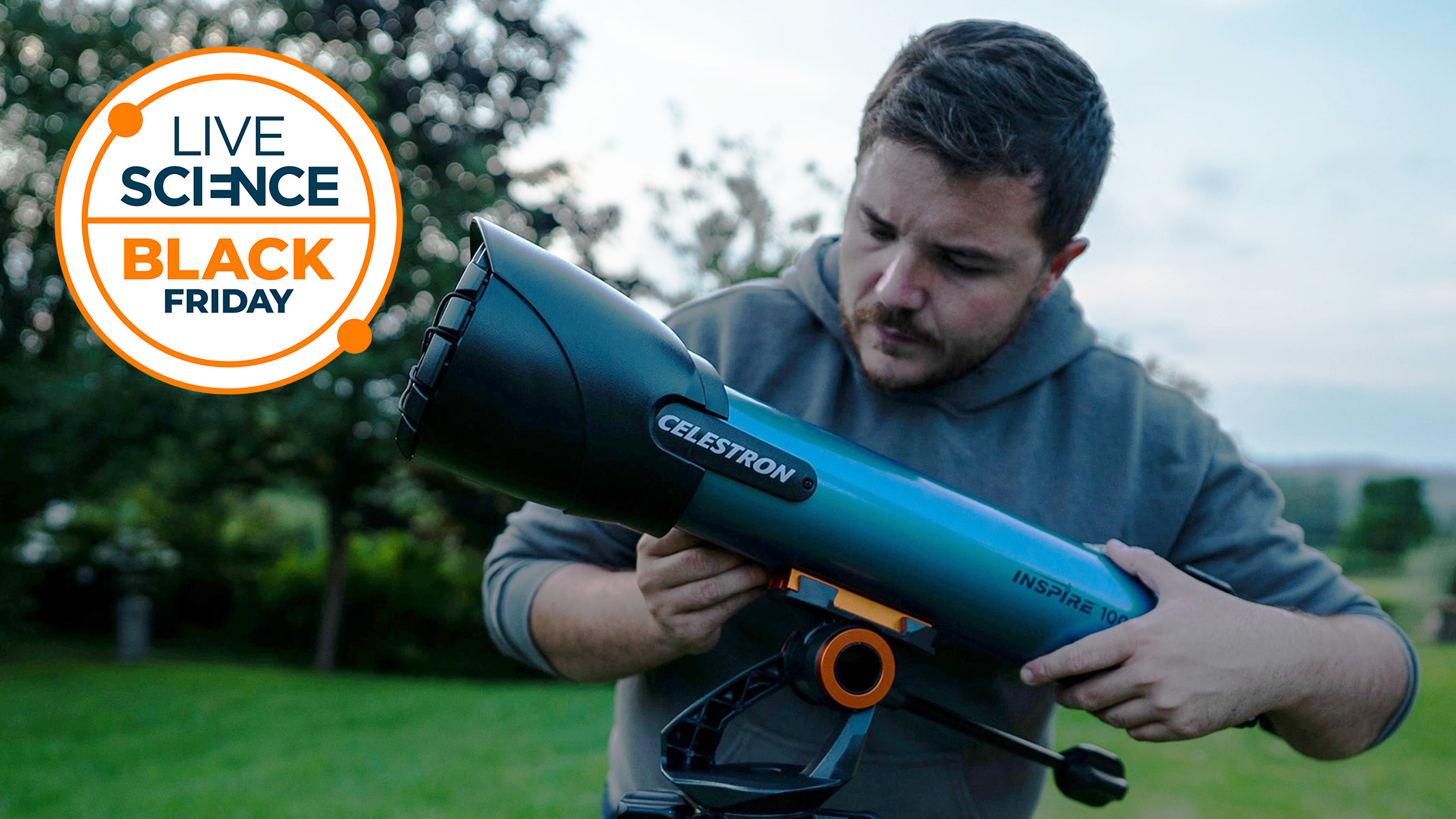 A man setting up the Celestron Inspire 100AZ outside