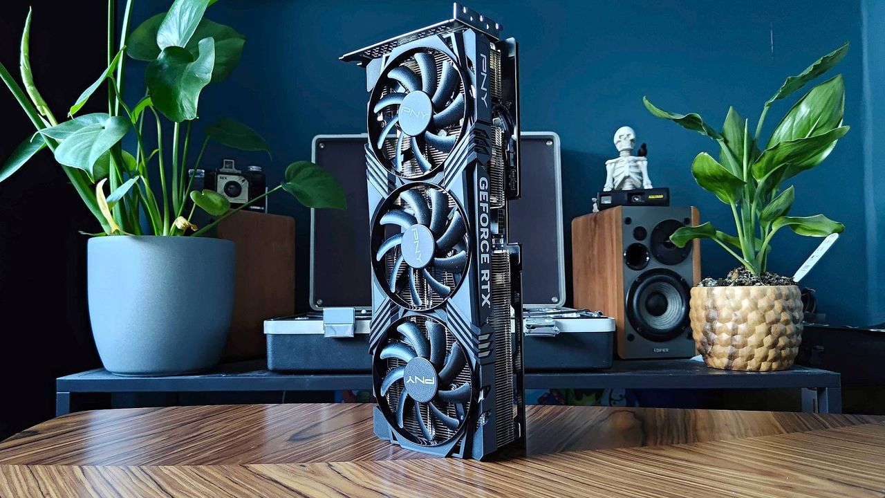 Nvidia GeForce RTX 4070 Ti Super PNY model sitting on wood table surrounded by plants